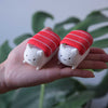 M.E.S.A. X Sushi Cat hand-finished 3D-printed tuna sushi cat figurines with red fish topping on beige display board