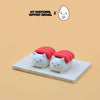 M.E.S.A. X Sushi Cat hand-finished 3D-printed tuna sushi cat figurines with red fish topping on beige display board