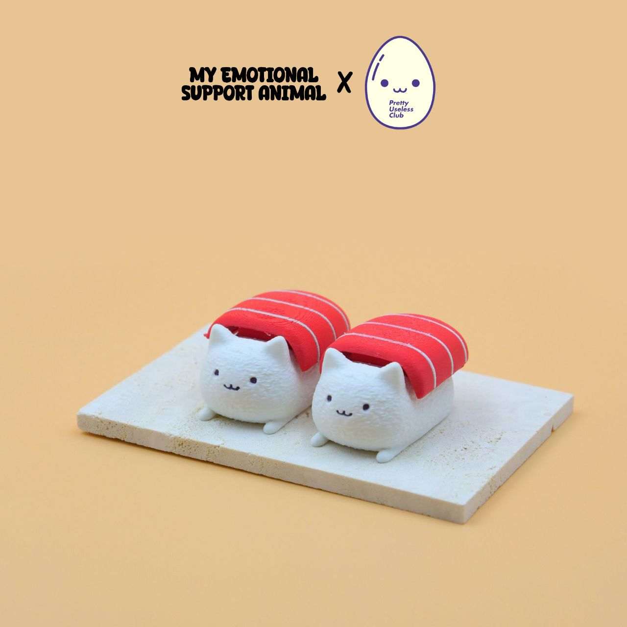 M.E.S.A. X Sushi Cat hand-finished 3D-printed tuna sushi cat figurines with red fish topping on beige display board