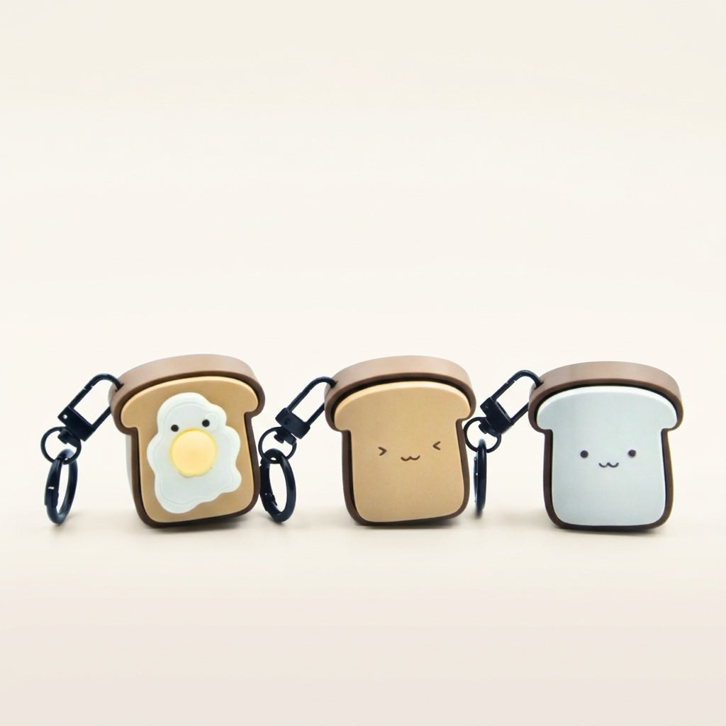 Toastie Meow Clicky Keychain set: Sunny Egg Toast, toast and plain toast cat-face keychains